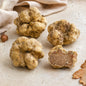 Fresh Tuber magnatum Pico white truffle with natural pale surface and seasonal ingredients